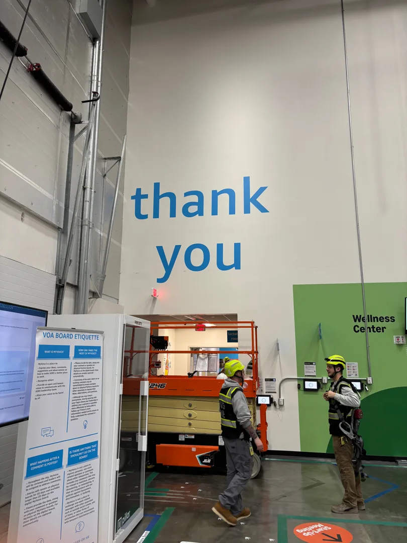 Completed thank-you wall graphic inside Amazon SOR3