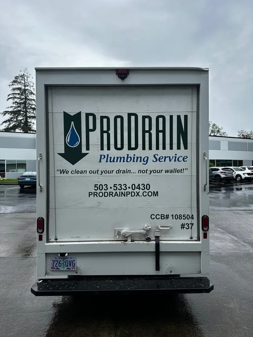 Completed contact information graphics on the rear box truck doors