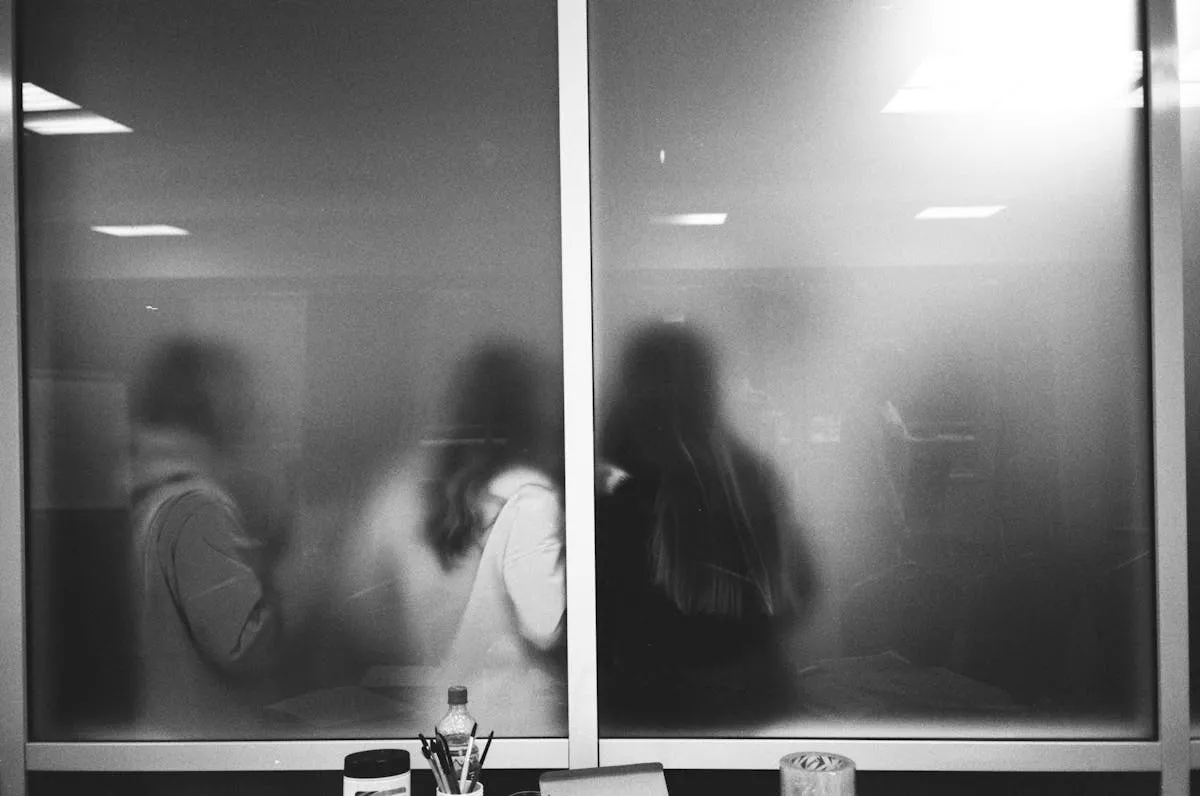Frosted vinyl privacy graphics installed on office conference room glass