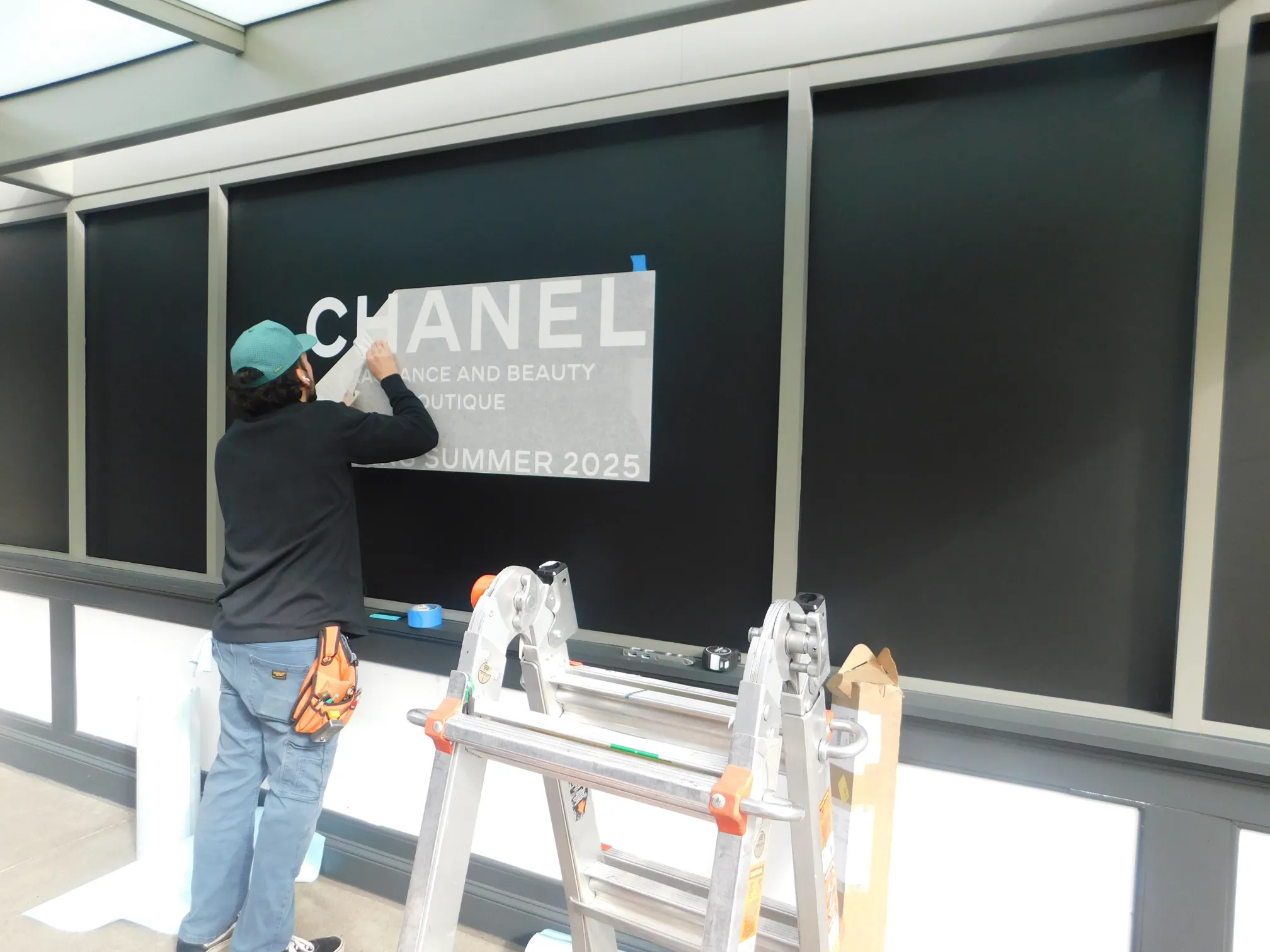 Vinyl graphics applied and finished as part of a commercial graphics installation