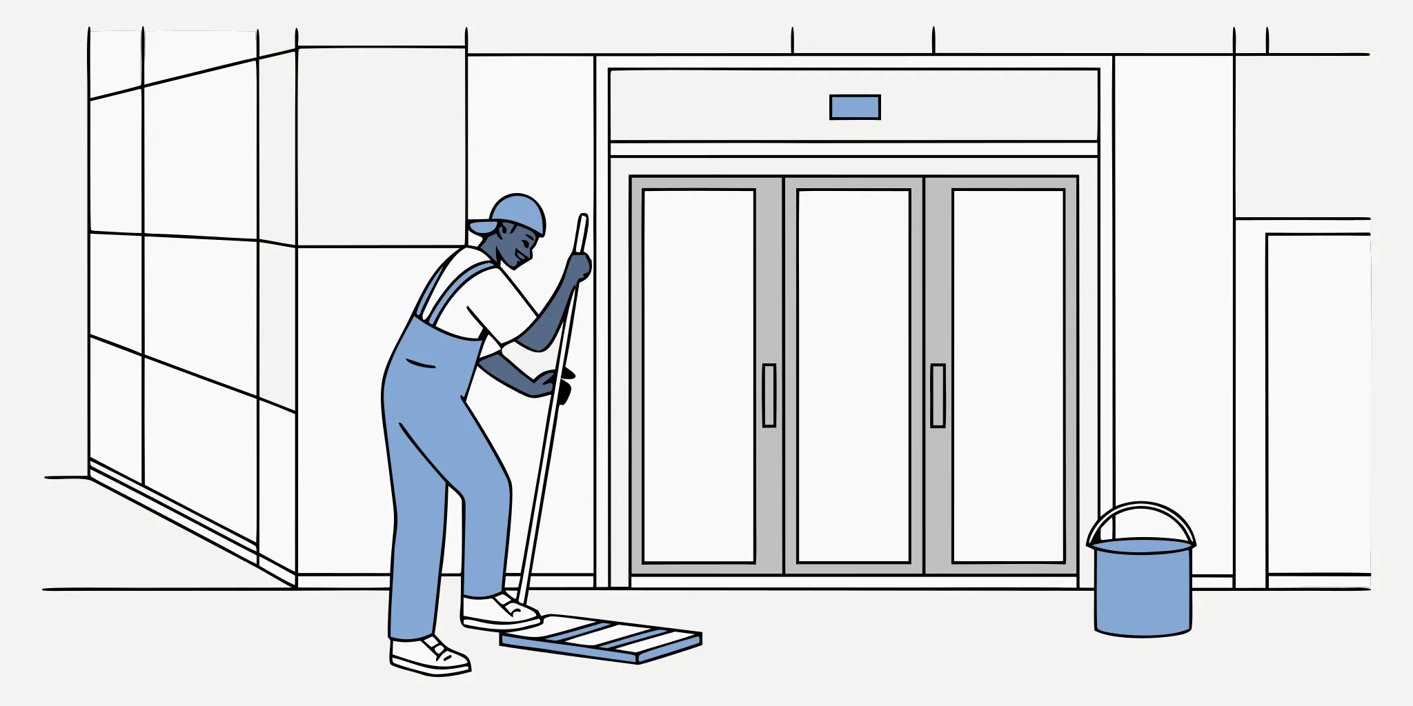 Certified installer aligning vinyl during elevator wrap installation