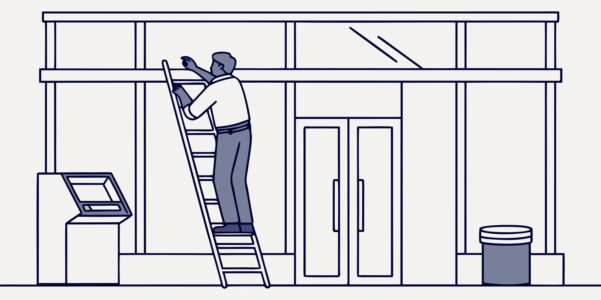 Installer applying privacy film during a bank branch rebranding graphics rollout