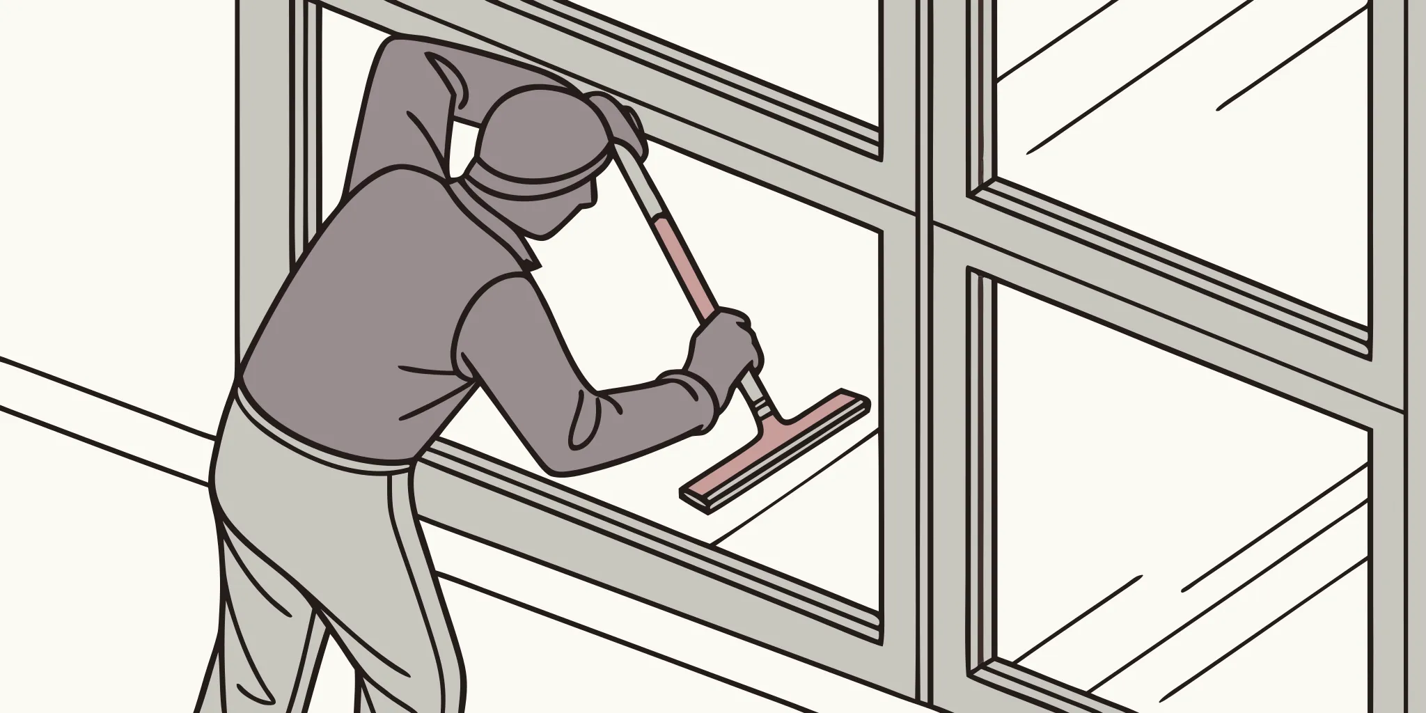 Professional vinyl installer applying outdoor rated graphics to a commercial storefront window using precision squeegee technique