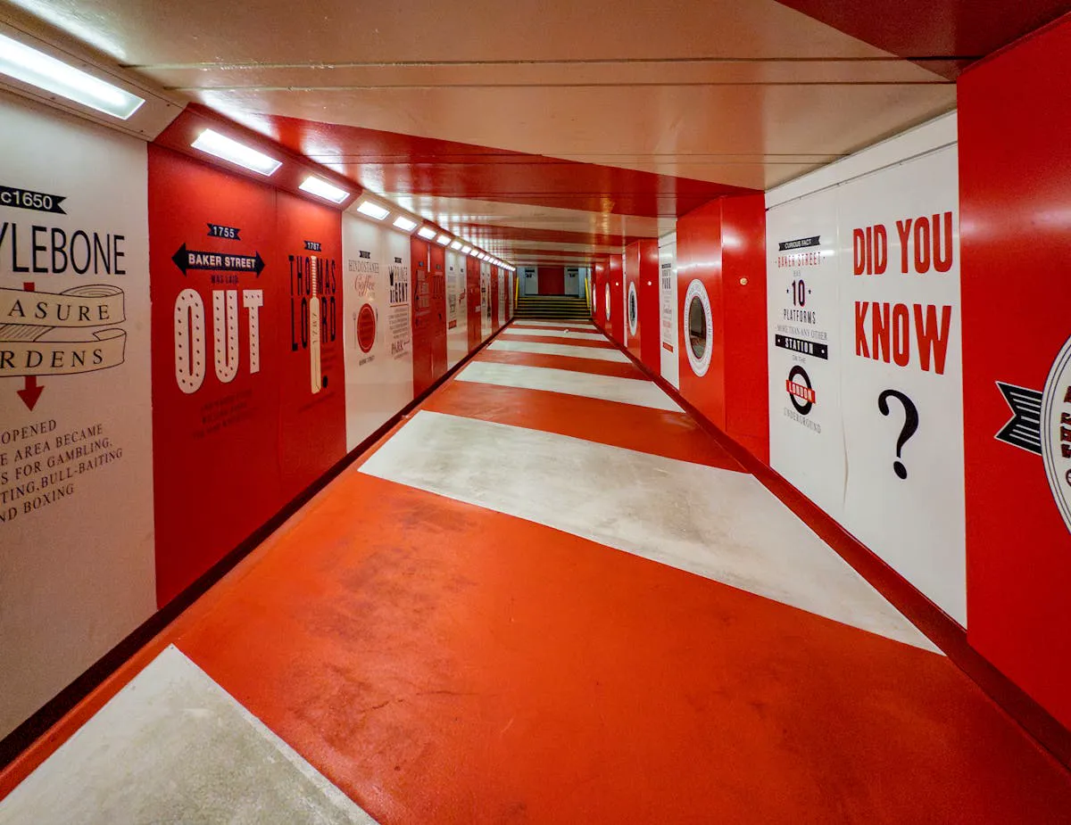 Colorful experiential graphics covering a pedestrian tunnel creating an immersive environment