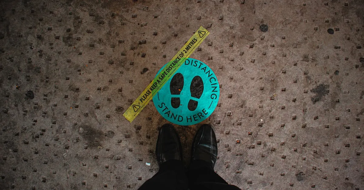 Person standing on a removable floor decal marker in a commercial space